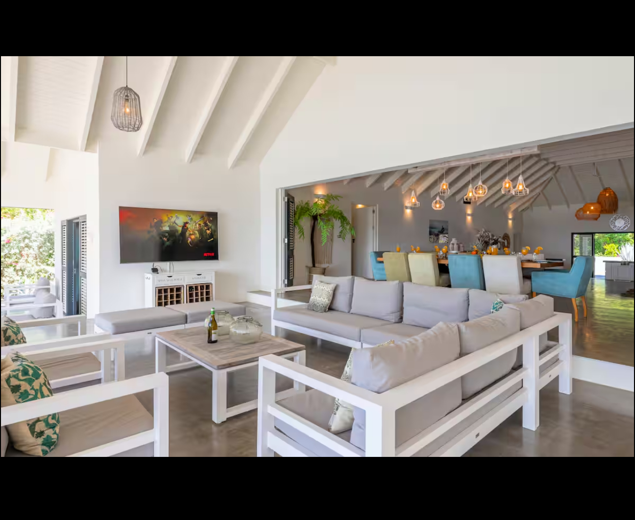 Spacious living room opening into the dining area