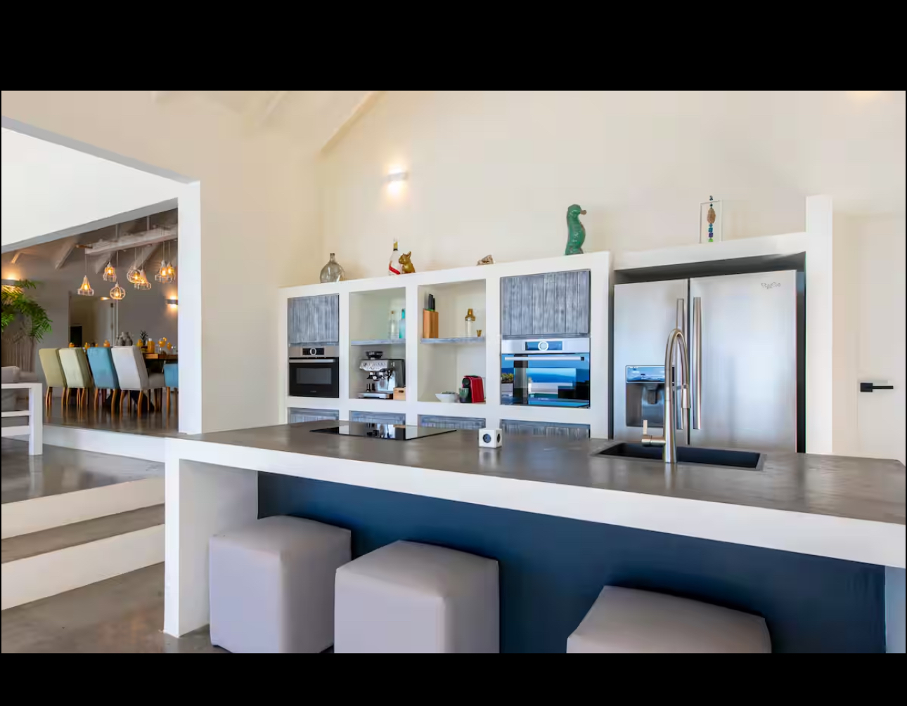 Modern open kitchen with island and stainless steel appliances
